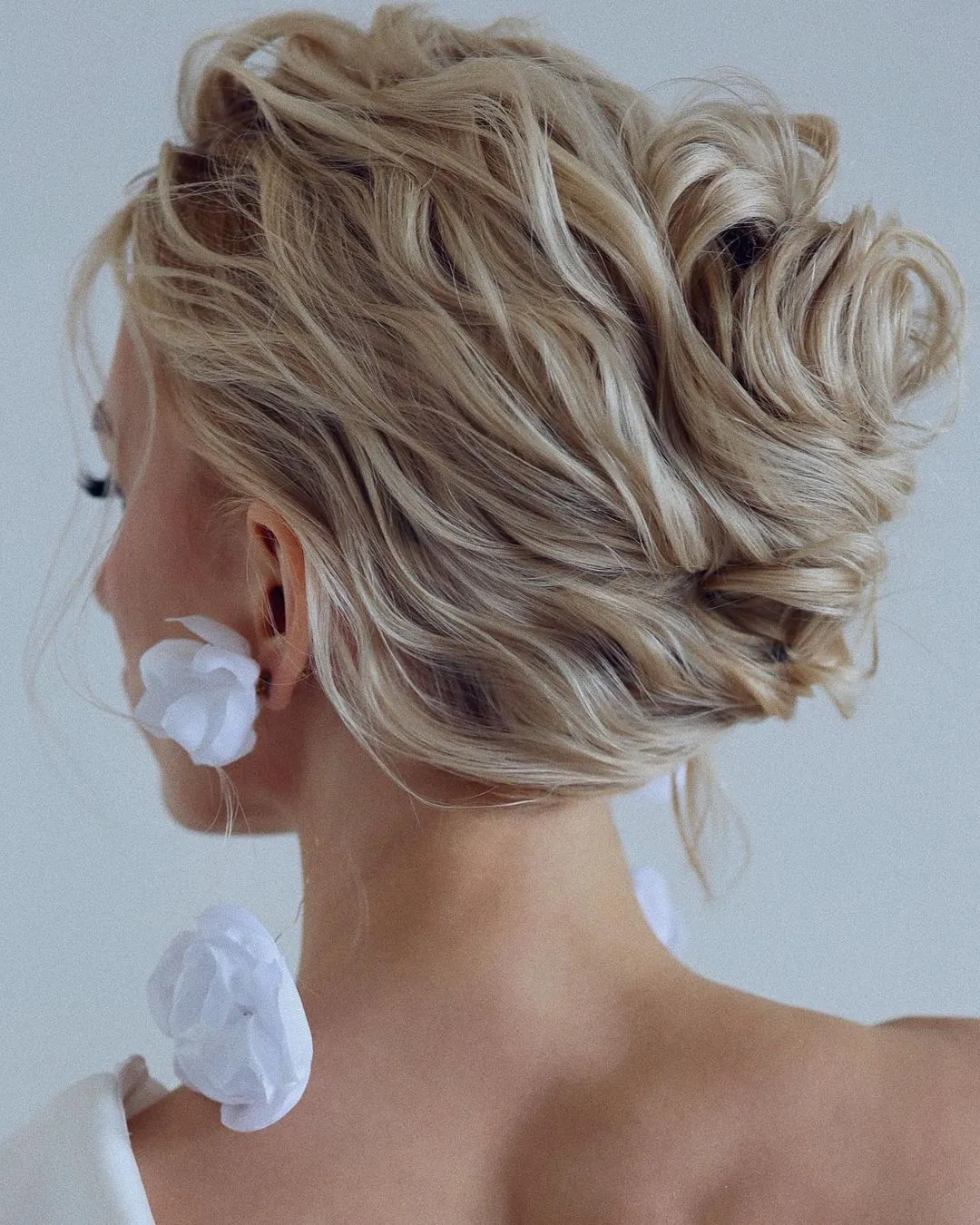 Beachy Waves Unleashed: A Step-by-Step Tutorial for Boho Vibes 5 Textured Updo for Beachy Waves
