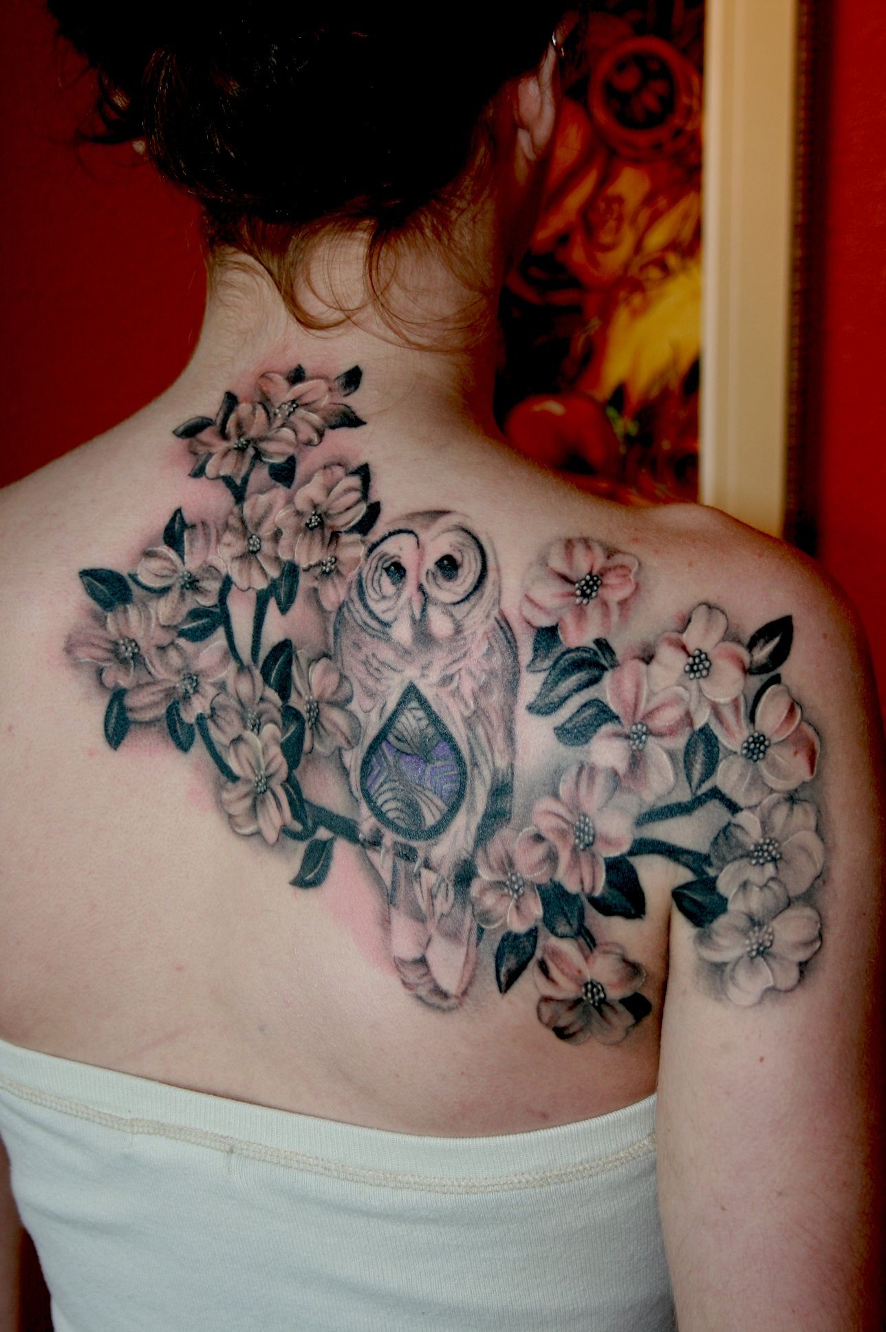 Flowers and owl tattoo