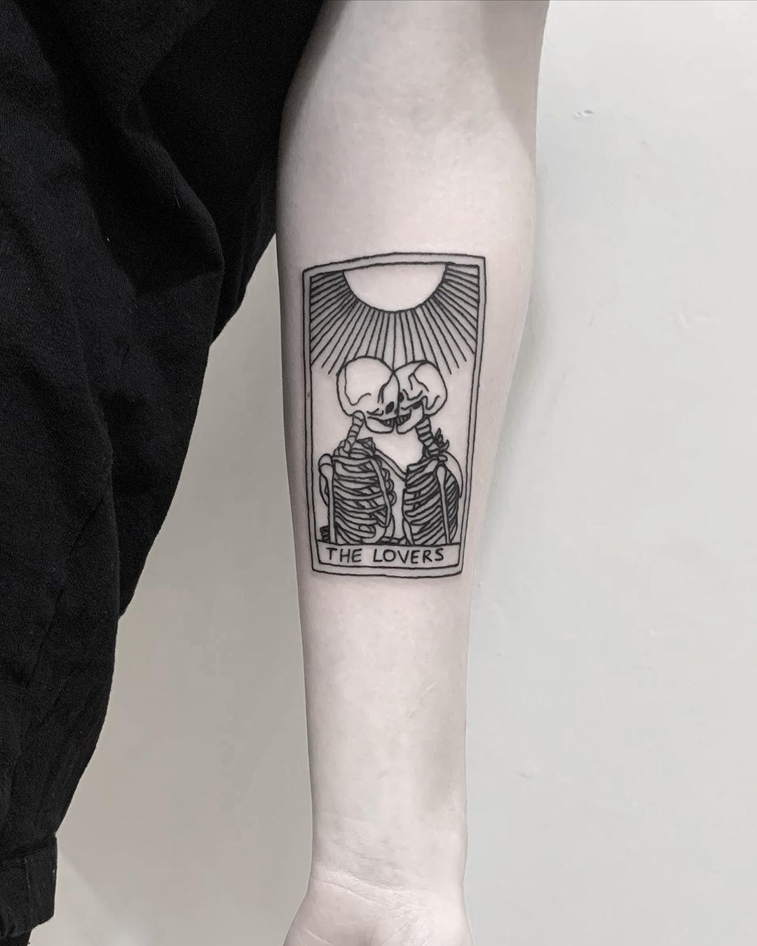 31 LGBTQ Pride Tattoos that Will Make Your Pride Month Even Better 27 Lovers tarot card Tattoo