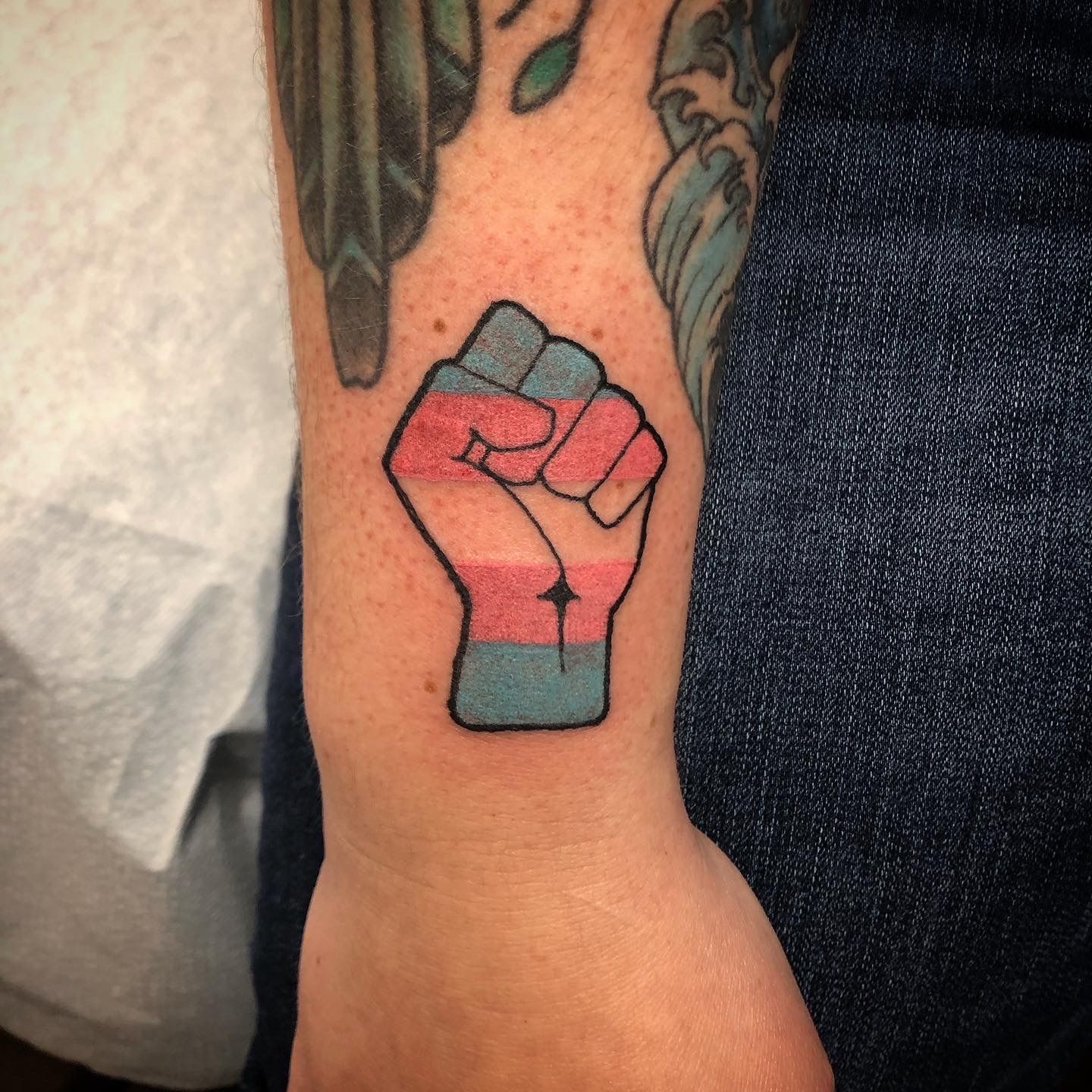 31 LGBTQ Pride Tattoos that Will Make Your Pride Month Even Better 12 Pride Fist