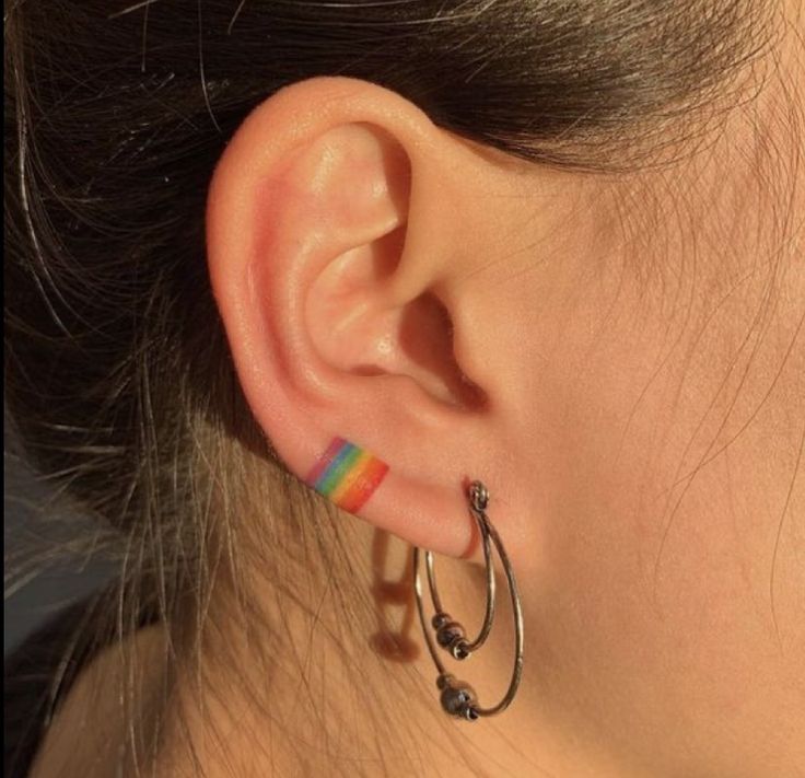 31 LGBTQ Pride Tattoos that Will Make Your Pride Month Even Better 21 Rainbow Ear-cuff