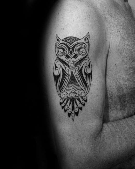 Tribal owl tattoo