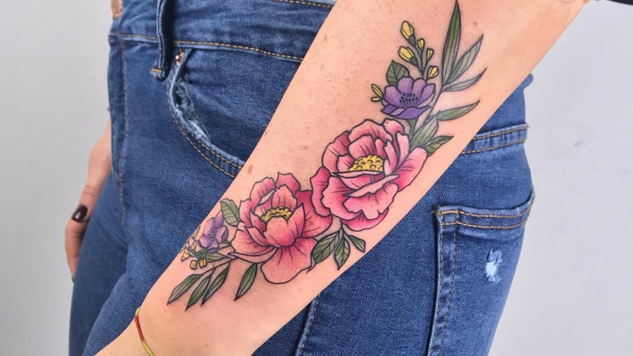 Aster and Daffodil tattoo by Kelly Doty TattooNOW