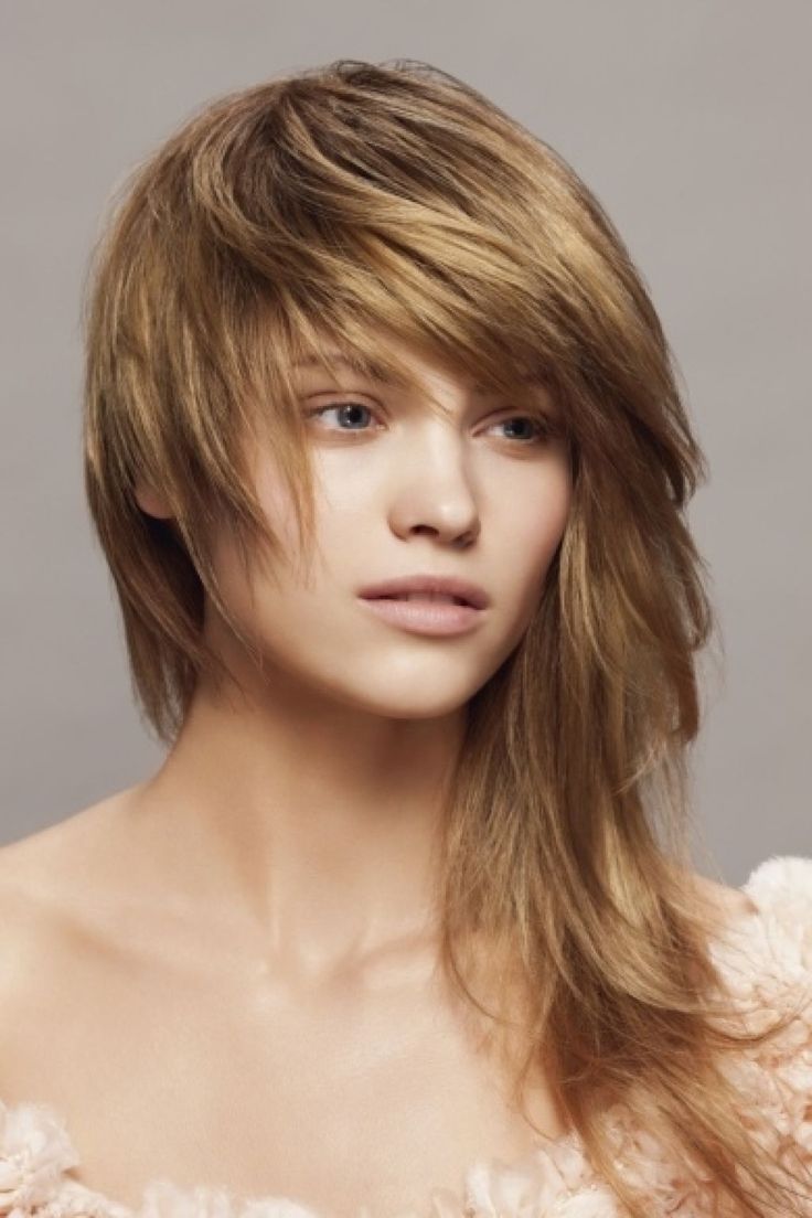 Bangs and Layers -The Dynamic Duo of Hair Fashion Top Beauty Magazines