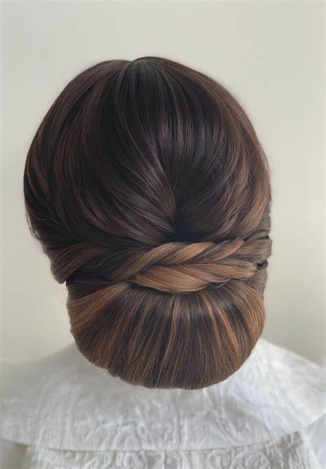 Chignons with a Twist- 30 Hairstyles That Will Add Flair to Your Look 28 Chignons with a Twist- 30 Hairstyles That Will Add Flair to Your Look Top Beauty Magazines
