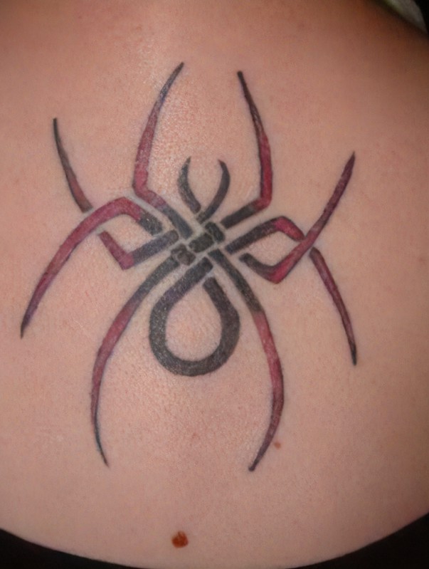 Threaded Whispers: Tattoos of Spider Symbolism Top Beauty Magazines