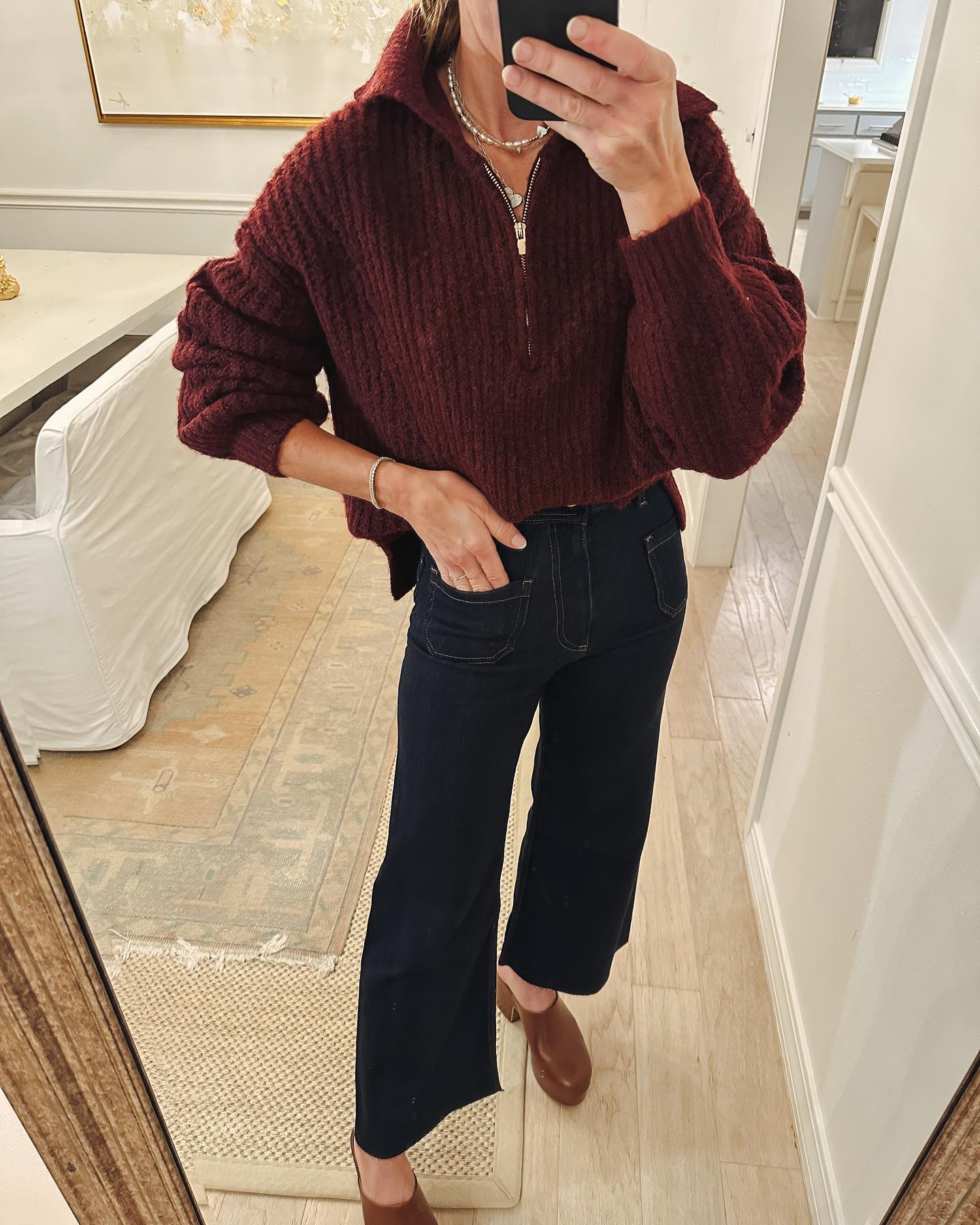 Grateful and Glam: Chic Thanksgiving Outfit Inspiration 17 Boot cut Jeans with Sweater